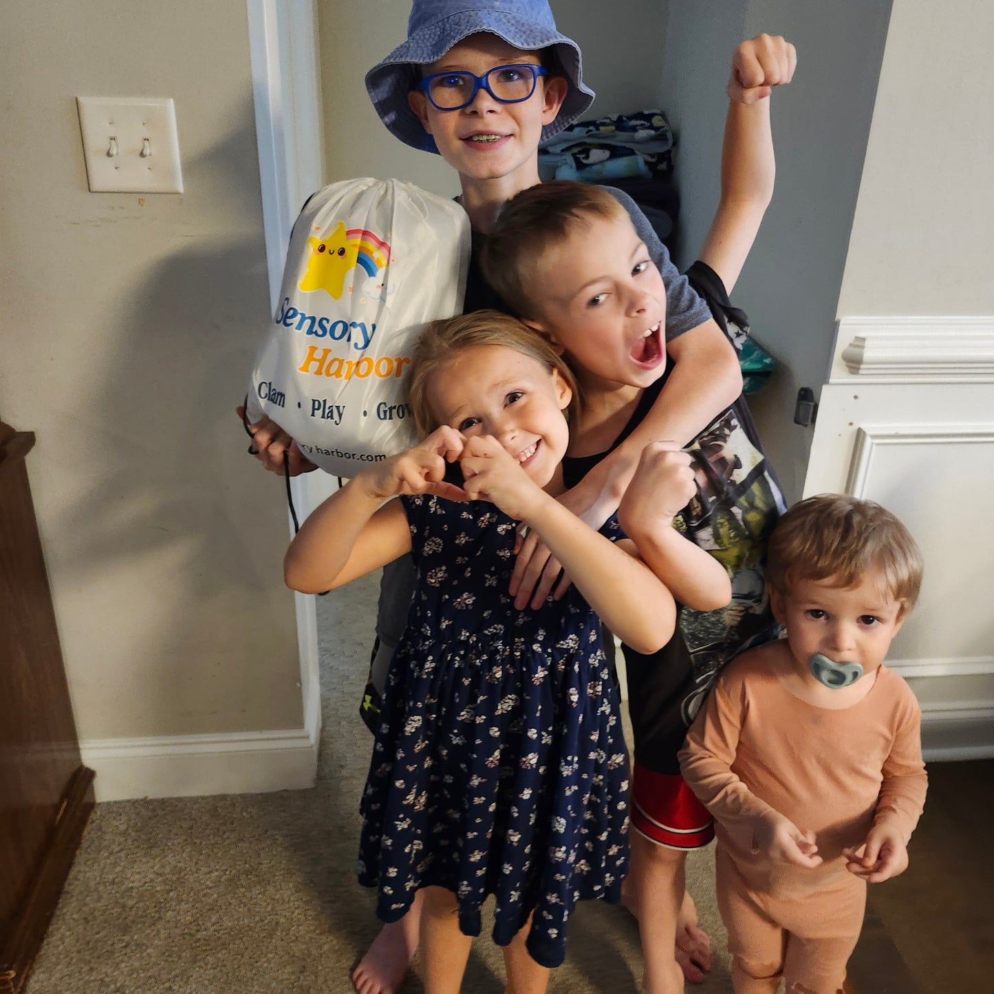 Real family unboxing — Growing Together: Neurodiversity at Home with Sensory Harbor cuddle swing