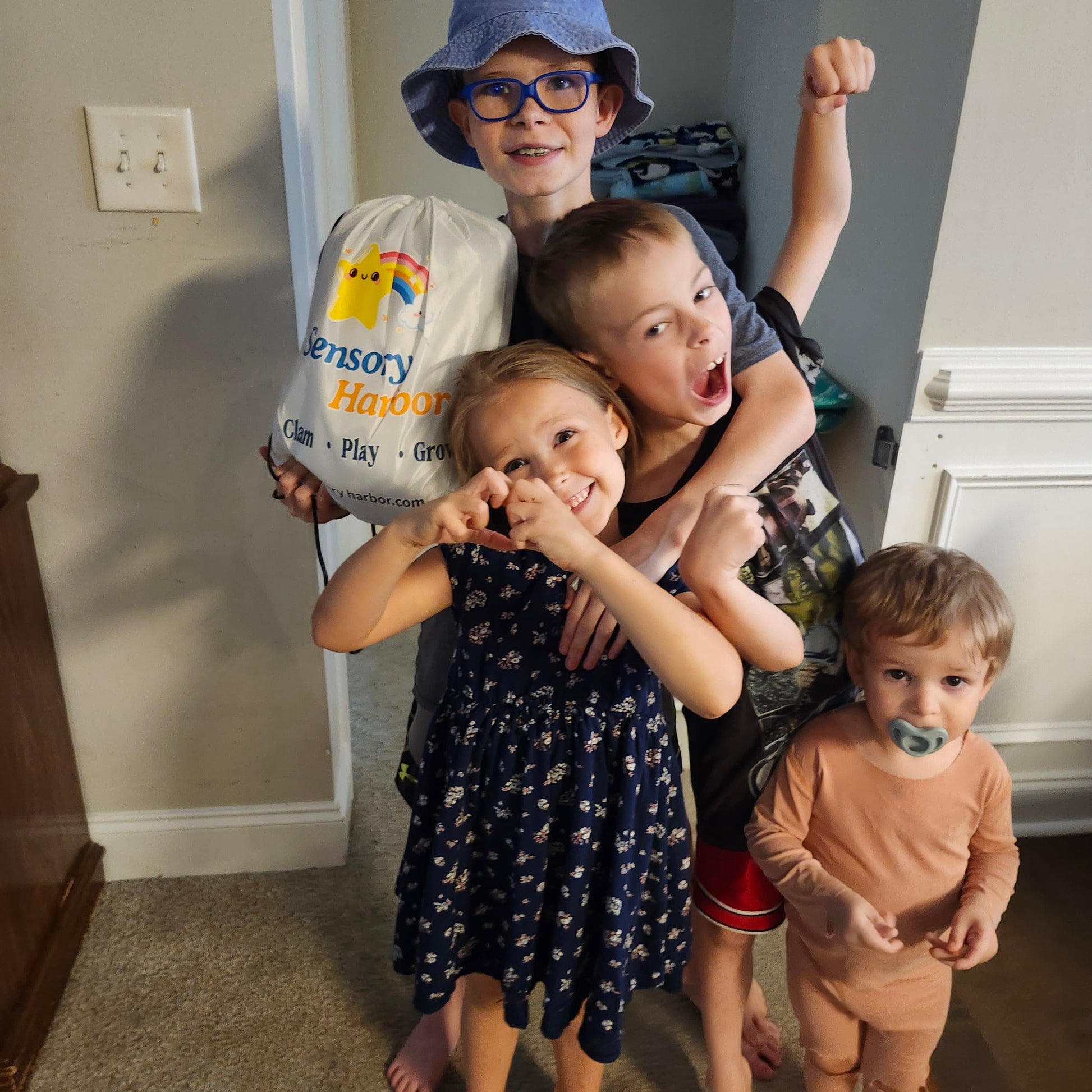 Real family unboxing — Growing Together: Neurodiversity at Home with Sensory Harbor cuddle swing